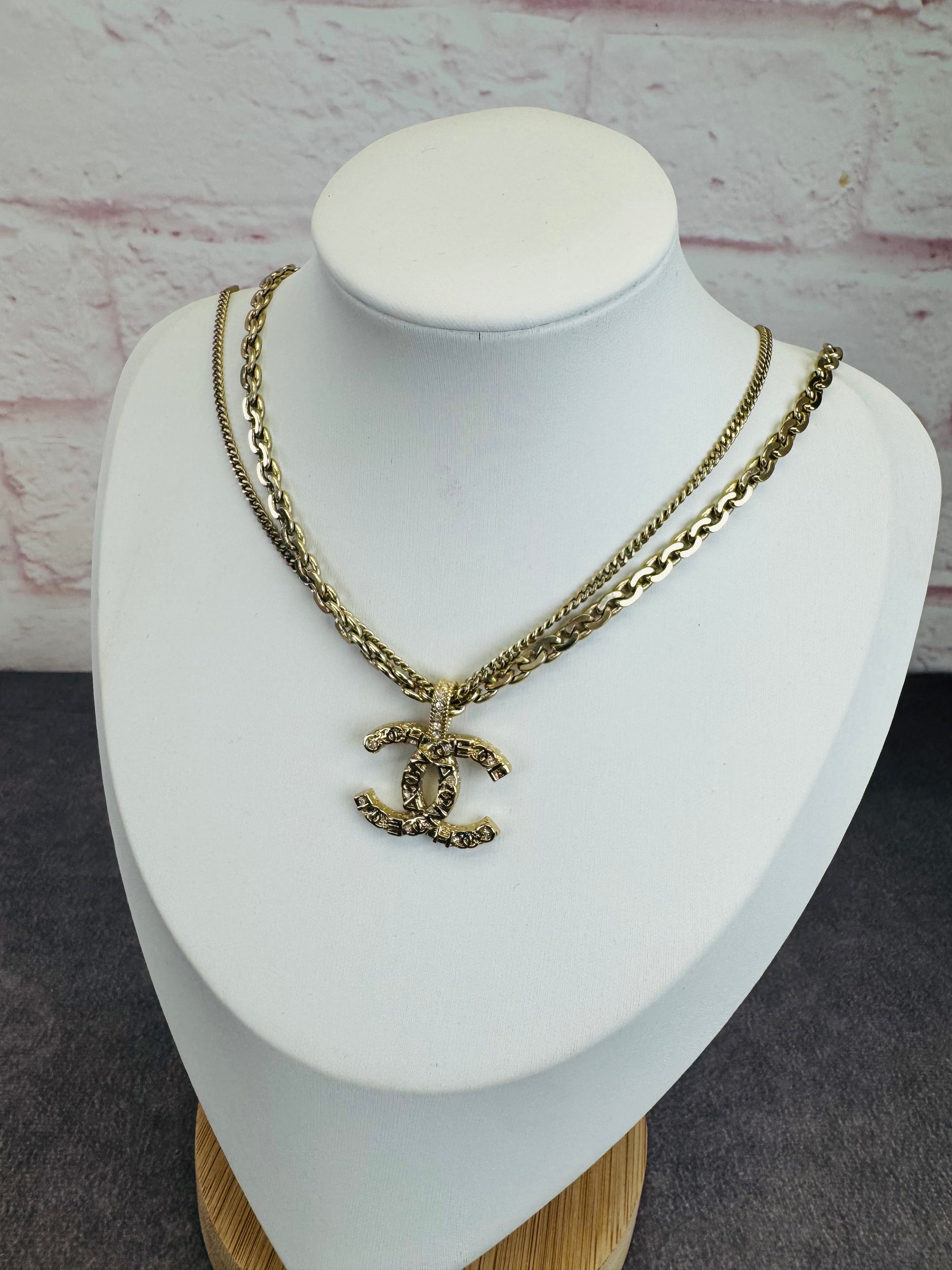 Chanel 21P Metal Double Layer Embossed Pendant CC Necklace