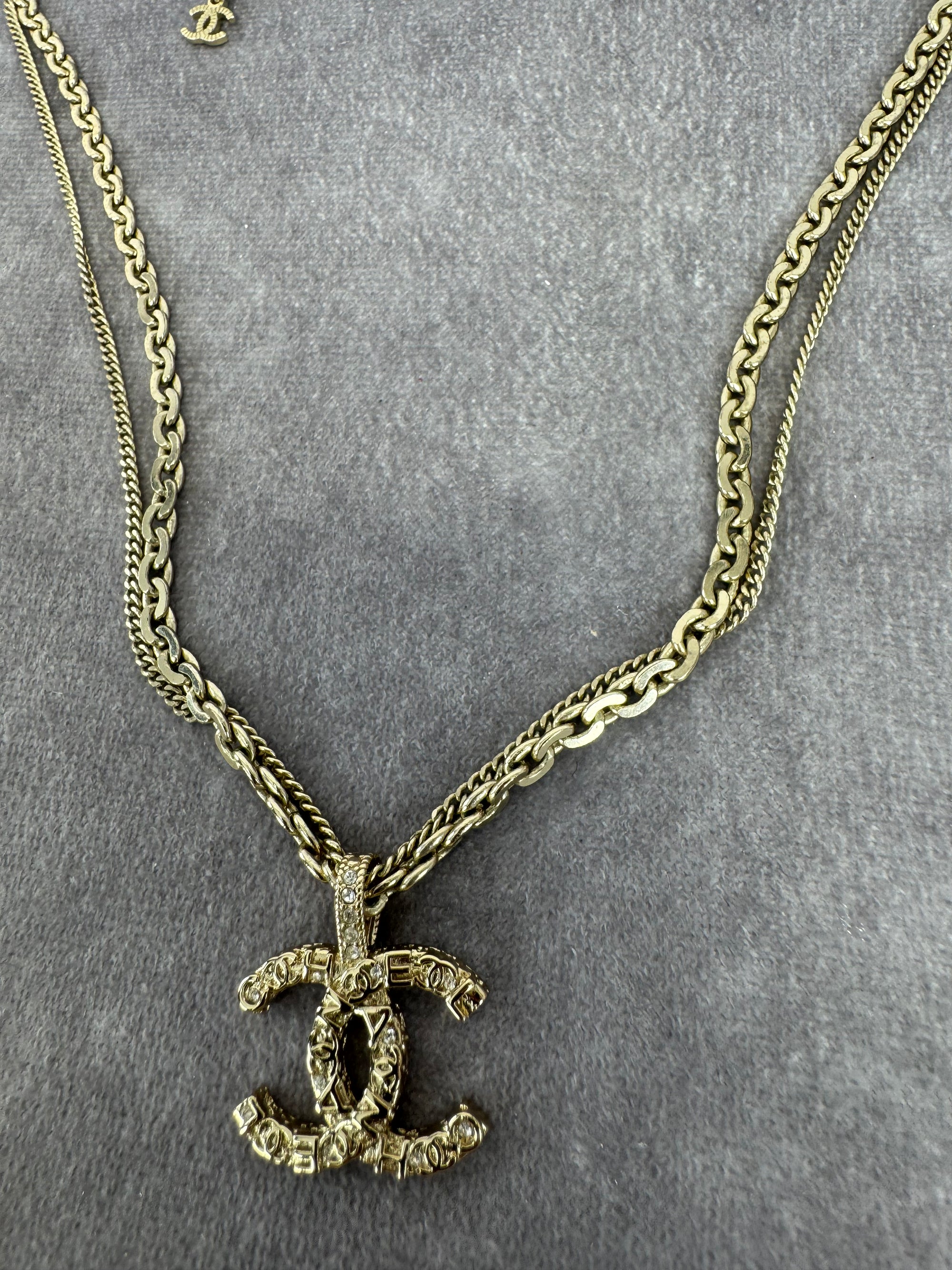 Chanel 21P Metal Double Layer Embossed Pendant CC Necklace