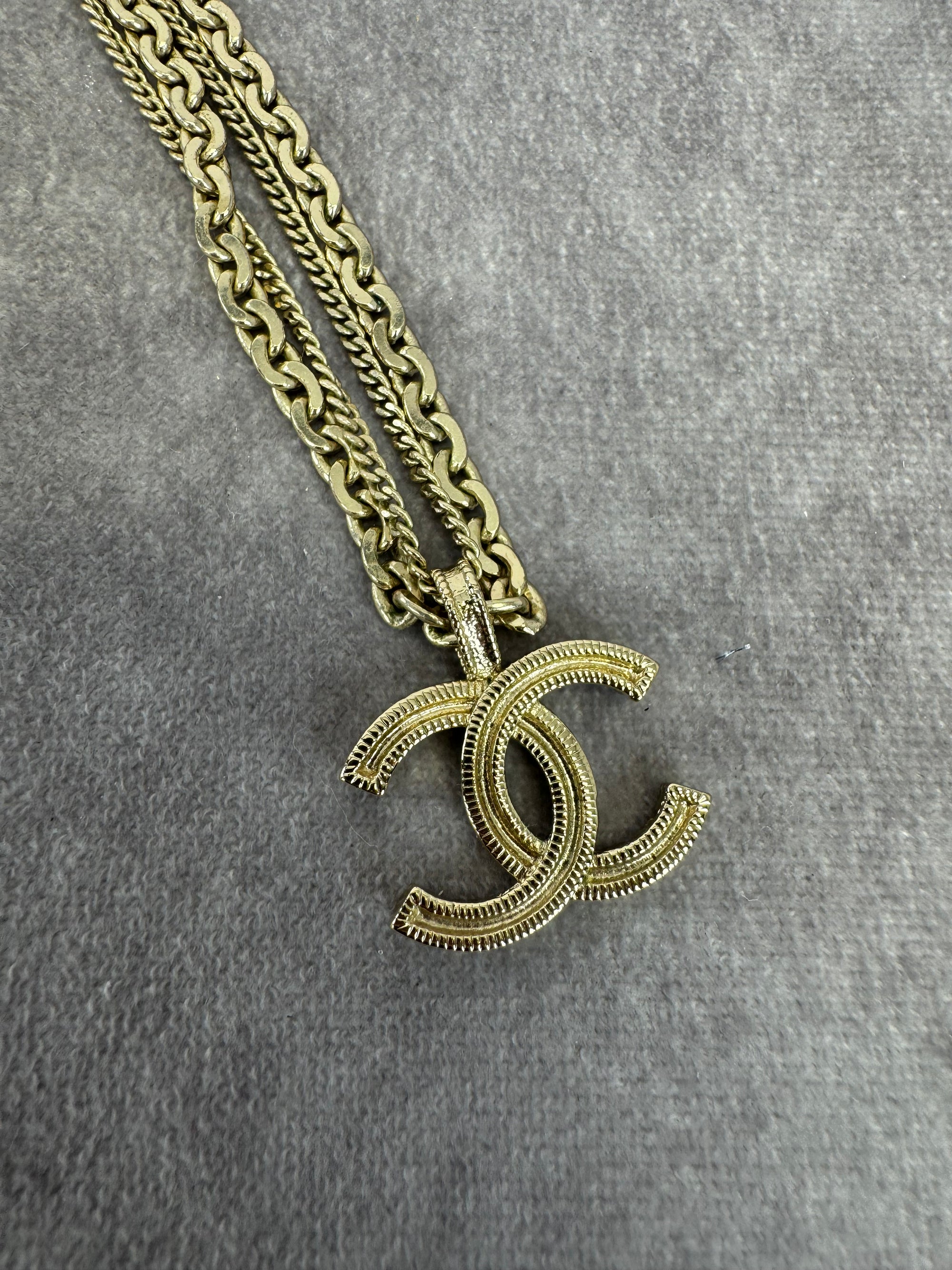 Chanel 21P Metal Double Layer Embossed Pendant CC Necklace