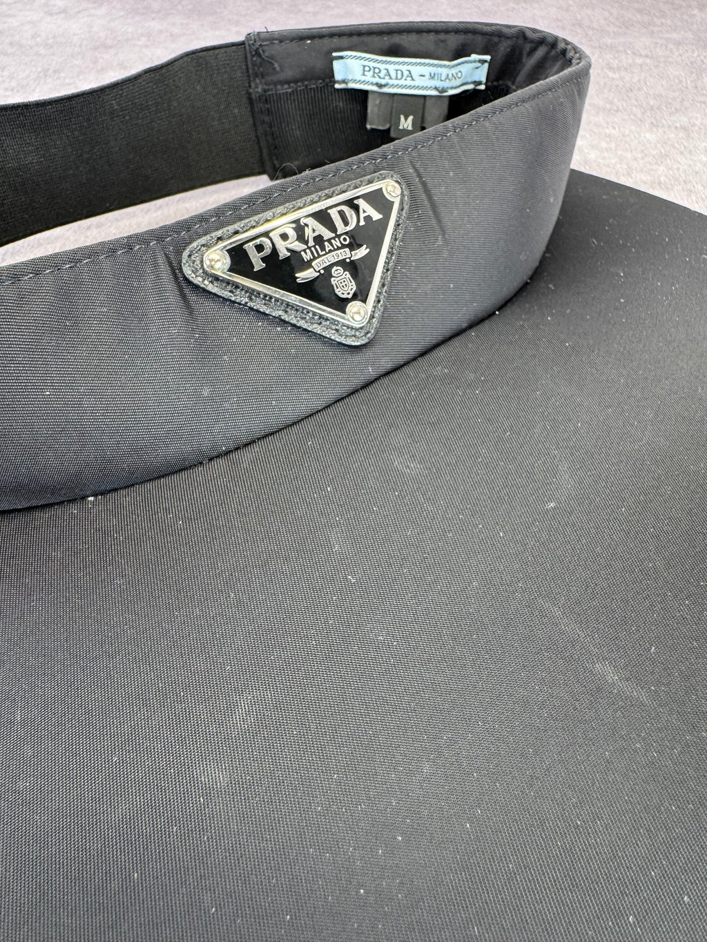 Prada Triango Metal Triangle Loops Womens Visor Medium