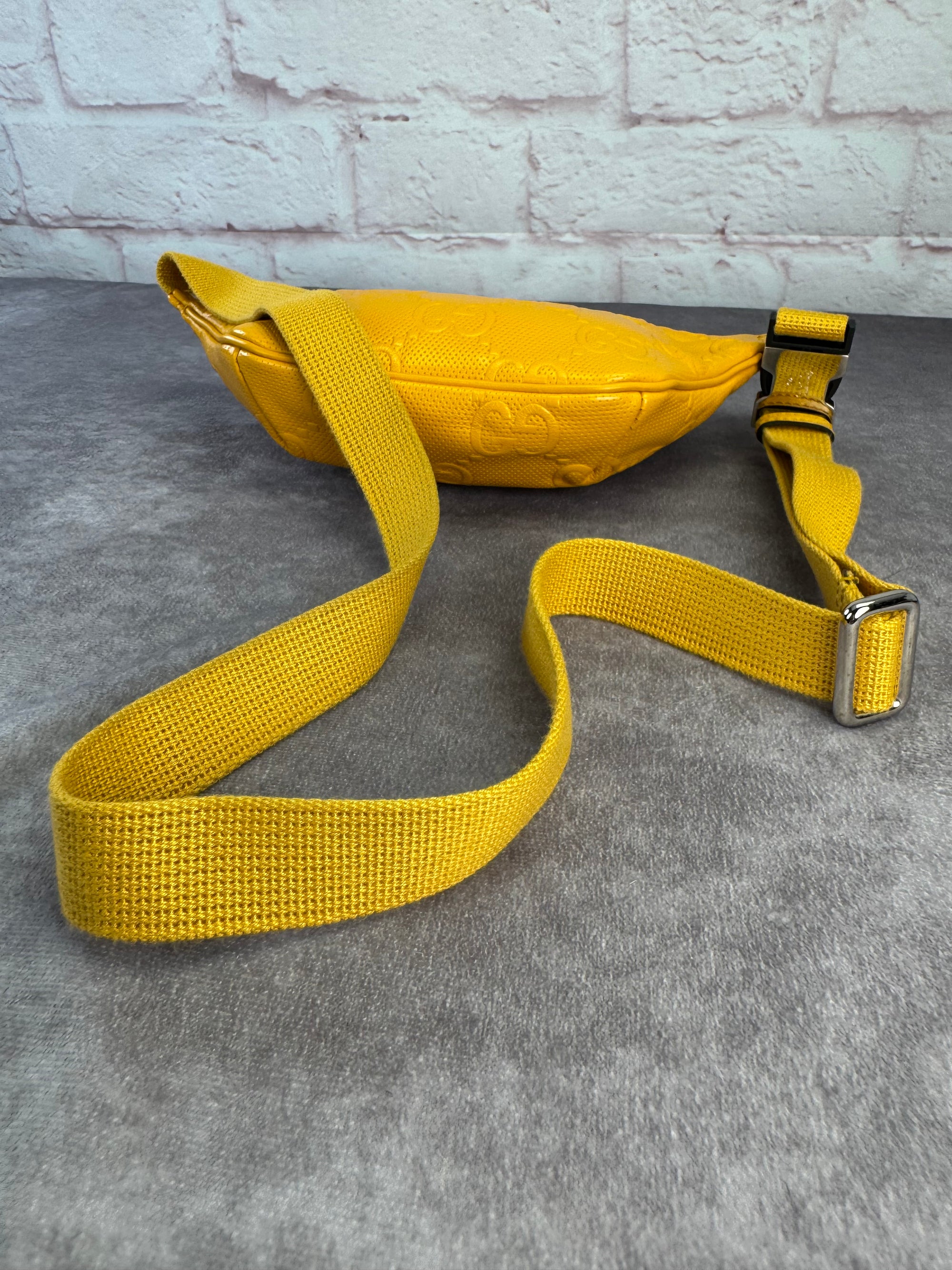 Gucci Embossed Gg Leather Perforated Belt Fanny Sling Bag