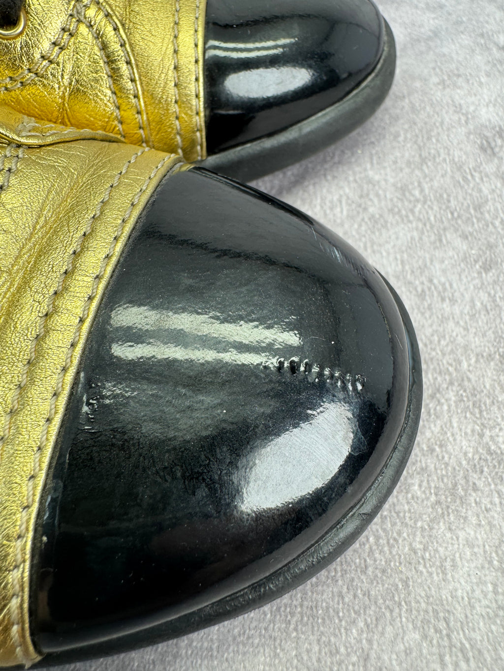 Chanel Gold BlackPatent And Leather Cap Toe Sneakers